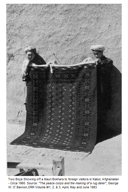 Two boys showing off a Mauri Bokhara to foreign visitors in Kabul, Afghanistan